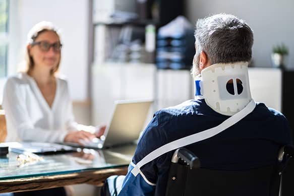 A victim of a bodily injury meets with a legal professional to discuss his options regarding liability.
