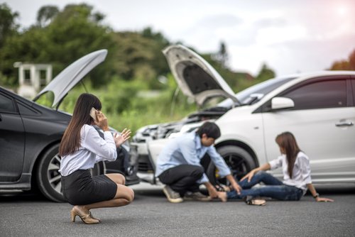 Bystanders assist a victim of bodily injury following an automobile accident