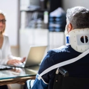 A victim of a bodily injury meets with a legal professional to discuss his options regarding liability.